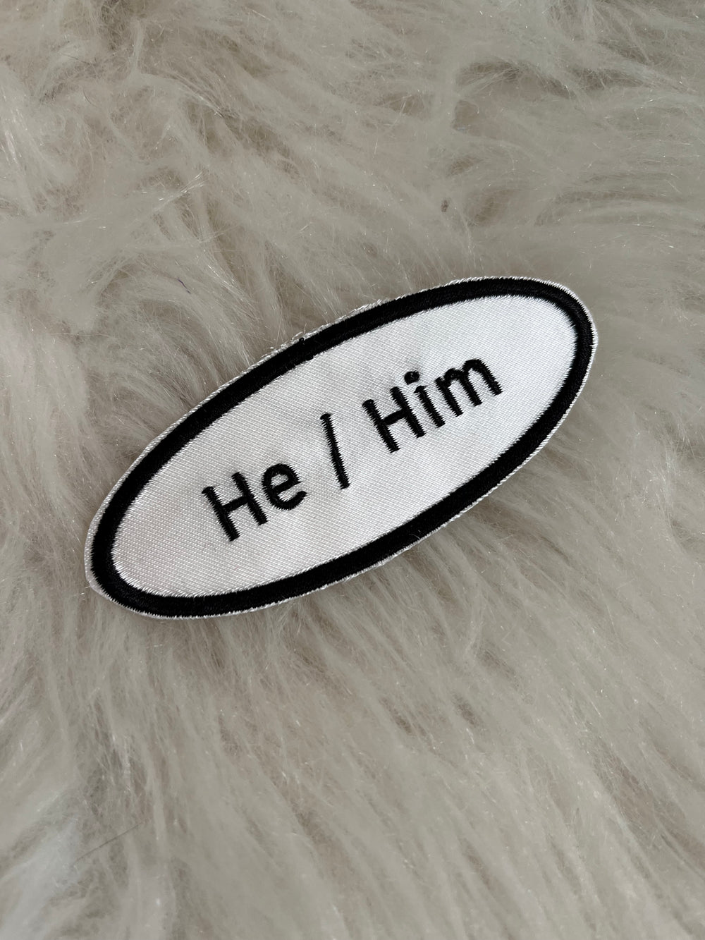 'He / Him' Patch. Black on White 4 Inch