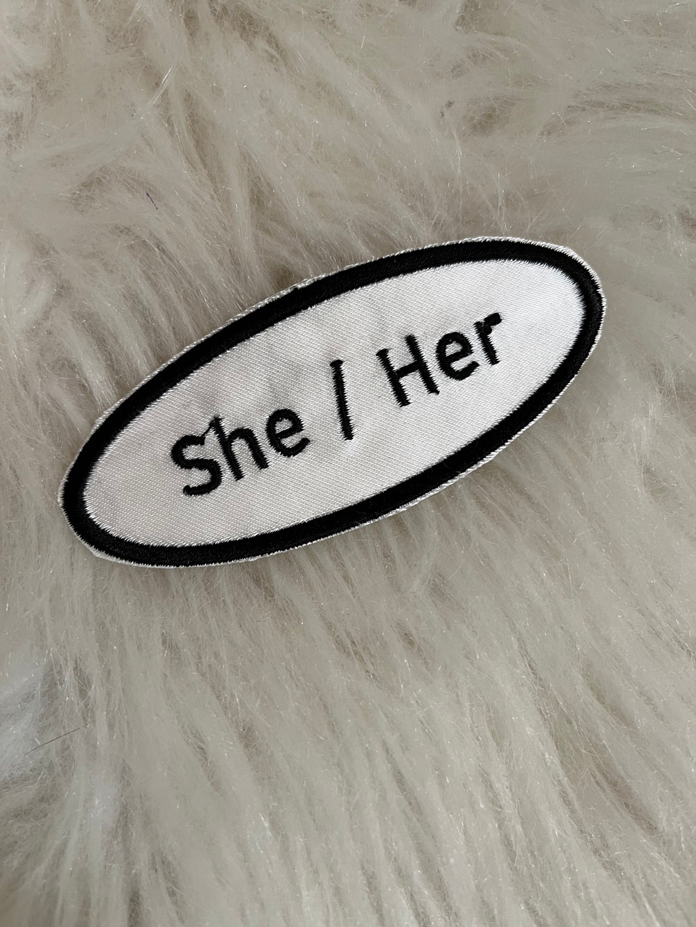 'She / Her' Patch. Black on White 4 Inch